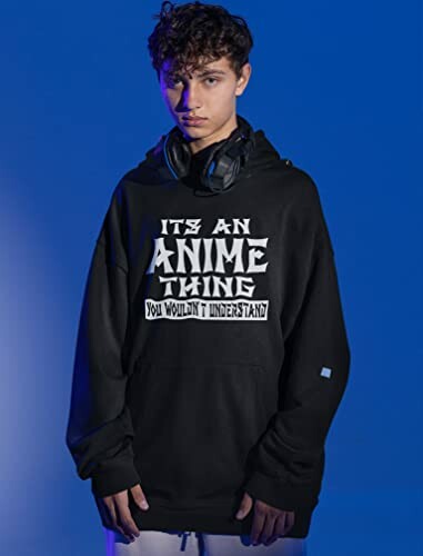 Person wearing a black hoodie with 'It's an Anime Thing' text